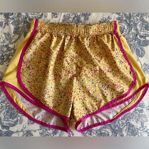 Nike Women's Yellow and Pink Athletic Shorts